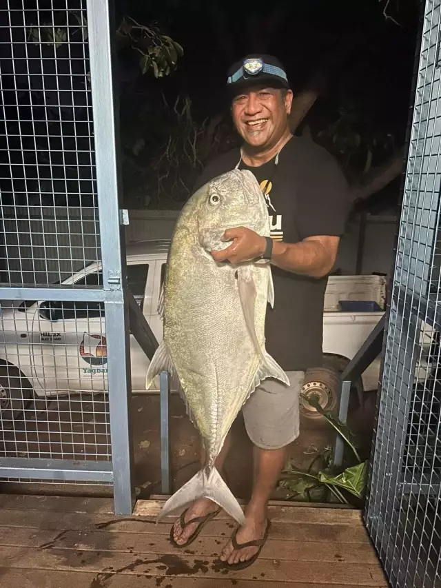 at least 35 kilo GT. Another smile not a smile trying to keep a straight face holding this monster